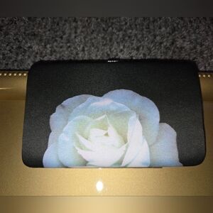 Floral Black Clutch By Harold Feinstein